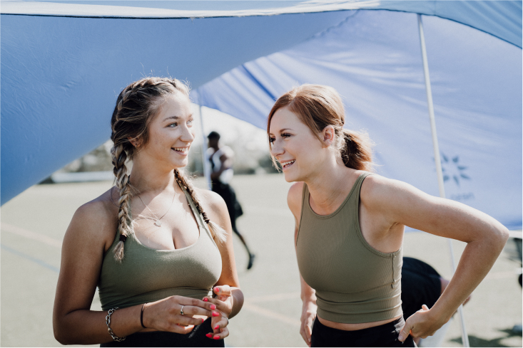 Two women at a sport event